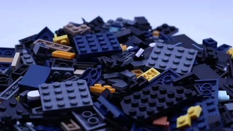 A rotating collection of Lego building blocks isolated on white. Stock Footage 333795884