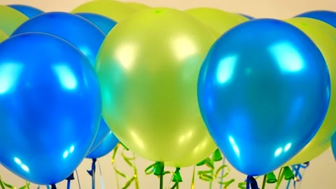 Rotating colored balls blue and yellow on white background Video stock 85561788
