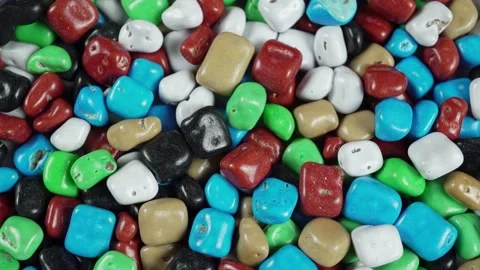 Rotating Colored Dragee Sea Pebbles. Видео 235521315