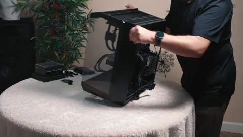Rotating computer case to back side and organizing internal cables Stock Footage 335070980