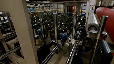 Rotating conveyor belt wheels in large-scale automated production. Video stock 289304978