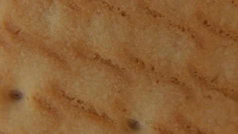 Rotating Cookie Surface Texture Macro Background. Видео 334675644