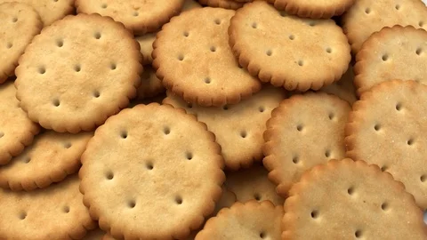 Rotating cracker cookies background. Tasty food Video stock 122303095