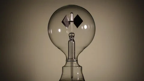 Rotating Crookes Radiometer Light Mill on Bright background Stock Footage 331100831