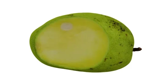 Rotating Cut Green Ivory Mango on White Background (Looping) Stock Footage 149345638