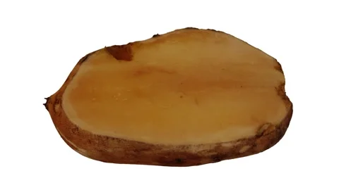 Rotating Cut Yacon on White Background (Looping) Stock Footage 149446910