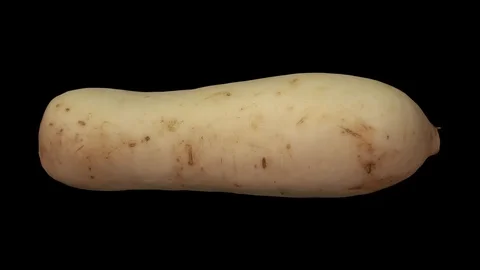 Rotating Daikon on Black Background (Looping) Stock Footage 93378875