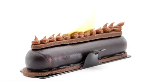 Rotating Delicious Gourmet Chocolate Eclair Delicacy, UK Stock-Footage 158839761