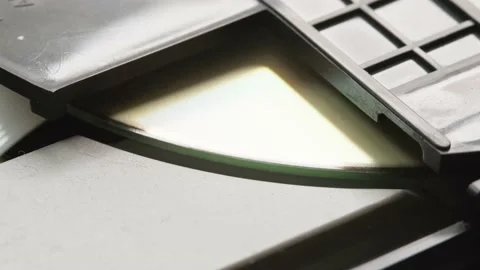 Rotating digital video disc. DVD-CD player inside view. Stock Footage 163019596
