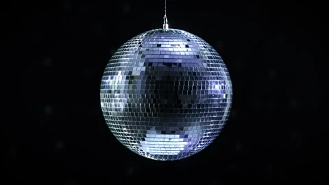 Rotating disco ball reflecting light on black background Видео 310367870