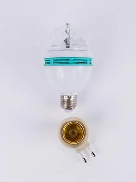 Rotating disco led bulb with brass socket Stock Photos