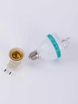 Rotating disco led bulb with socket close up Stock Photos