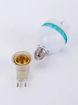Rotating disco led bulb with socket diagonal Stock Photos