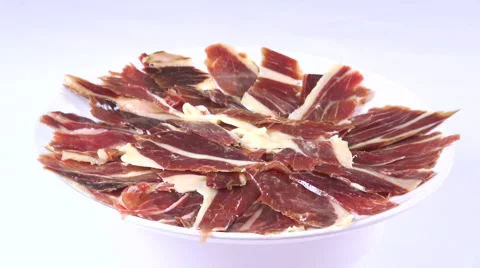 Rotating dish with iberico ham  Stock Footage 56295460