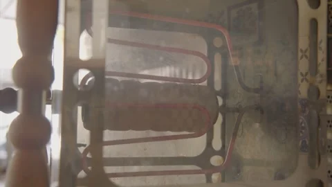 Rotating Dough Cylinder Baking in Commercial Oven at Sydney Cafe Interior Stock Footage 345659061