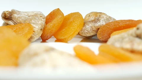 Rotating dried Figs on white background in right side Stock Footage 87746701