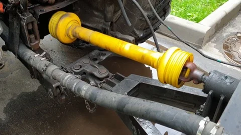 Rotating driveshaft of the tractor Stock Footage 114068290