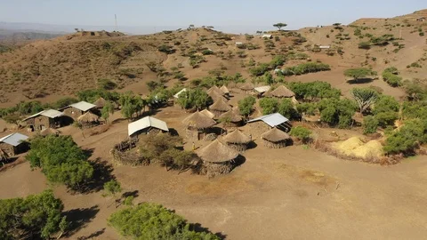 Rotating drone flight around remote village with classic houses in Ethiopia Stock-Footage 114389963