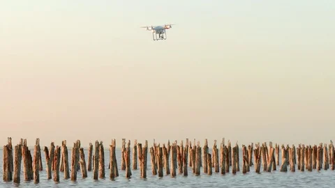 Rotating drone over lake surface Stock Footage 77726483
