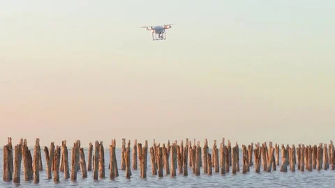 Rotating drone over lake surface Stock Footage 77734019