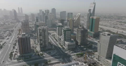 Rotating drone shot between towers in Lusail city in Doha, Qatar. Stock Footage 175179564