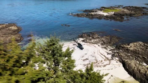 Rotating drone shot of helicopter on off... | Stock Video | Pond5