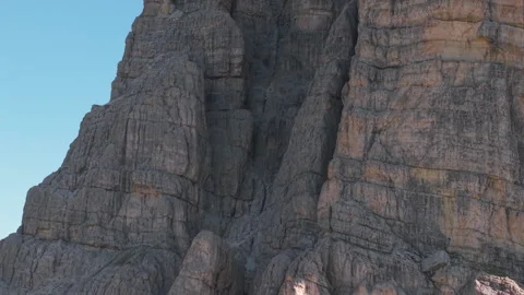 Rotating Drone Tilt Up Along Lastoi de Formin Cliffs Stock Footage 336843250