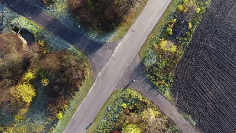 Rotating drone video flying above an intersection Video stock 228673089