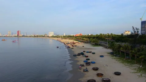 Rotating Drone View of Da Nang Beach at Sunrise With Coastal Skyline Stock Footage 340487410