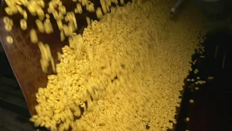 Rotating drum for mixing rings with syrup. 3 Shots. Stock Footage 205872458