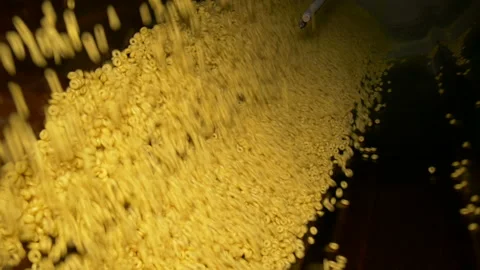 Rotating drum for mixing rings with syrup. Stock Footage 205873032