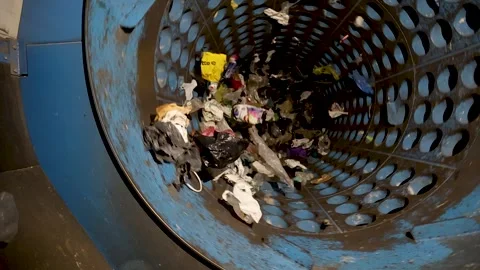Rotating drum separator processing mixed waste in recycling facility Stock Footage 333345348