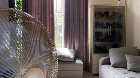 Rotating electric standing floor fan, 4K Video stock 273122964
