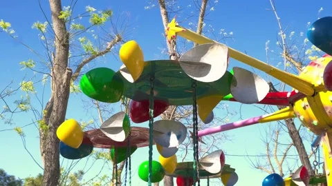 Rotating elements of children carousel, close-up Stock Footage 334856642