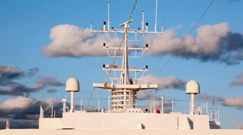 Rotating elements of radar and transmitters of floating ship Stock Footage 11548392