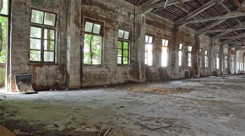 Rotating of an empty industrial loft in an architectural background with bare Stock Footage 54598387