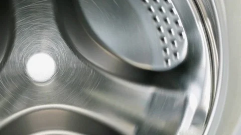 Rotating empty washing drying machine in laundry Stock Footage 69979874