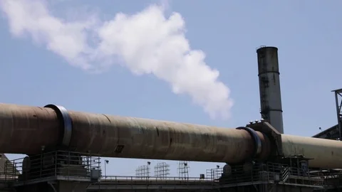 Rotating FACTORY PIPE, STILL, visible Smoke and Sky Stock Footage 79242893