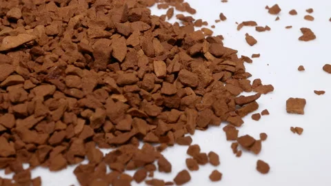 Rotating of falling instant coffee on white background Stock Footage 100343582
