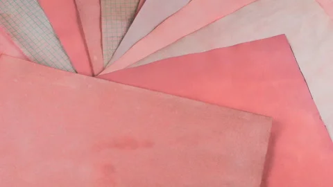 Rotating fan of handmade paper sheets dyed with natural vegetable pigments. Stock-Footage 330253095