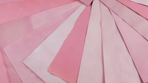 Rotating fan of handmade paper sheets dyed with natural vegetable colorants. Stock Footage 330274633