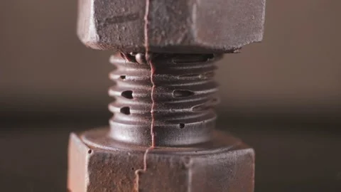 Rotating fastening bolt with vintage thread in close-up Stock Footage 167214262