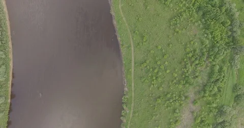 Rotating fly over river field day 스톡 동영상 108744059