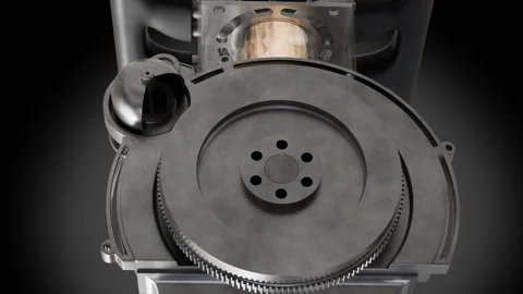 Rotating flywheel showcasing engine parts in motion with clear shapes Video stock 323731159