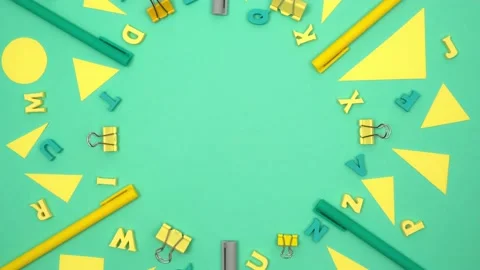 Rotating frame made of stationery and educational supplies on green background. Stock Footage 203532980