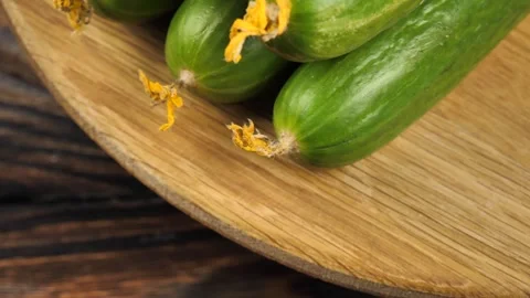 Rotating fresh green cucumbers. Healthy food concept. Food for vegetarians. raw Stock Footage 248090140