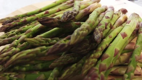 Rotating fresh green spring asparagus  Stock Footage 75746575