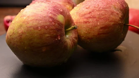 Rotating Fresh Organic Red Apple Close Up Studio Shot Stock Footage 327790360