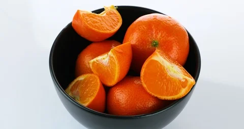 Rotating fresh tangerines isolated on white background Stock Footage 102264449