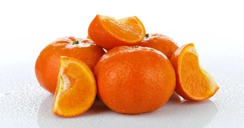 Rotating fresh tangerines isolated on white background Stock Footage 102266322
